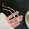 Collar retro francés estilo Chanel de camelia negra con gota de aceite y perlas para mujer, combinable con todo, sentido de alta calidad, nicho, accesorios de lujo ligero