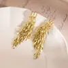 Pendientes de Oreja de Trigo Dorado Transfronterizos con Borla Larga para Mujer, Lujo Ligero, Exquisitos, Estilo Frío, Moda de Gama Alta, Pendientes Elegantes