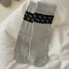 Calcetines apilados con etiqueta de tela de encaje en el tobillo, calcetines de otoño estilo floral hasta la mitad de la pantorrilla, calcetines de chica estilo coreano con lunares y lazo