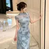 Nuevo vestido cheongsam de verano 2026, retro chic y elegante, estampado, con calados, corte ajustado, estilo chino, largo