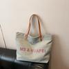 Bolsa de Lona para Estudiantes Universitarios Primavera y Verano Gran Capacidad Bolso de Hombro Resistente Estilo Nuevo 2026 Bolso Tote Simple Casual