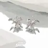 Pendientes de botón de flor de iris vintage usados para mujer, de nicho, sensación de alta gama, temperamento retro, modernos, individuales, joyería para orejas versátil