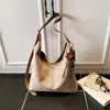 Bolso bandolera versátil para mujer 2026 nuevo estilo moderno bolsa de tacto de alta gama bolso casual para el trabajo de un solo hombro bandolera bolso para el trabajo