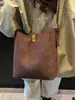Yaozi 2026 bolso retro versátil de principios de otoño, bolso tote de gran capacidad, bolso de hombro cruzado de moda para madre e hijo