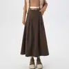 Moderna falda midi de pana retro para mujer, nuevo estilo coreano otoño e invierno 2026, falda acampanada de línea A que cubre la cadera
