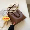 Bolso de mujer de alta calidad y gran capacidad, nuevo y moderno bolso de hombro 2026 con compartimentos, estilo bolsa cubo