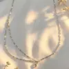Moderna, Sencilla, Versátil Collar Colgante de Perlas Redondas Transparentes, Lujo Ligero, Gama Alta, Diseño Único, Cadena para Clavícula para Mujeres