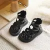 Sandalias Romanas huecas retro ins 2026 verano nuevo versión coreana zapatos de princesa tejidos cruzados para niñas para combinar con faldas