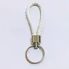 Nuevo llavero de cuerda de cuero tejido, llavero colgante creativo para mochila, llavero para empujar, pequeño regalo, llavero para coche al por mayor