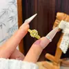 Anillo Huevo de Paloma Dorado Ardiente para Mujer 2026 Nuevo Estilo Caliente Simple Lujo Ligero Diseño de Nicho Sensación de Alta Gama Anillo para el Dedo Índice
