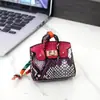 Porta-moedas Mini Tendência Estampado em Forma de Casa, Versátil e na Moda, Bolsa Pequena Portátil para Fone de Ouvido e Moedas, Com Pingente