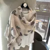 Novo lenço longo de seda com textura impressa de algodão e linho, xale feminino para primavera e outono, xale versátil de proteção solar de luxo leve