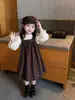 Vestido para Niñas 2026 Otoño Nuevo Estilo Vestido de Tirantes Cuadros Retro para Niñas Bebé Versátil Versión Coreana Vestido de Tirantes