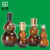 Botella de Aceite Esencial Forma de Calabaza Doble de 10ml-100ml, Botella Sub de Vidrio Dorada Ámbar a Prueba de Luz con Tapa de Doble Línea para Empaque de Cosméticos