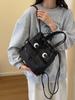 Bolso de lona de gran capacidad para mujer 2024 Nueva Moda bolso casual de hombro con cordón bolso de cubo mochila versátil bolso de viaje