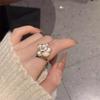 Anillo de camelia suave estilo retro francés para mujer, diseño de nicho de alta gama, ligero y lujoso, con fragancia.