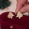 Pendientes de botón de árbol de Navidad de copo de nieve giratorio estilo Tiktok para mujer, aguja de plata 925, personalidad, simple, temperamento, textura, pendientes para mujer
