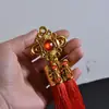 Borla larga dorada para sombrero Nudo chino palabra de bendición borla de doble tubo suministros festivos accesorios colgantes borla de nudo chino al por mayor