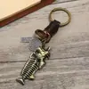 Joyería de Comercio Exterior de Moda Personalidad Creativa Aleación Colgante Espina de Pescado Llavero Decorativo Cuero Tejido Accesorio Versátil