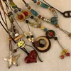 Collar de Cordón de Cuero Estilo Coreano Dulce y Fresco con Corazón Redondo de Resina, Cadena para Clavícula Moderna y Elegante con Diseño Único para Mujeres