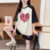 Traje simple de verano de dos piezas para mujer, pantalones cortos holgados de talla grande de manga corta para cubrir el vientre, conjunto de lujo accesible súper hada estilo Ins