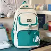 Bolsa de monedas de oso de color block de gran capacidad, elegante y simple, mochila escolar 25 modelo nuevo para niñas de secundaria y preparatoria