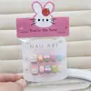 Macarrón de colores gato de dibujos animados flor lazo corazón dulce y juguetón uñas postizas manicura infantil uñas ponibles