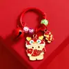 Dragón lindo año del dragón metal dragón etiqueta pequeña colgante Año Nuevo llavero de coche accesorios para bolso regalo pequeño para pareja venta al por mayor