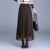 Falda midi plisada taiwanesa con una textura distintiva, nuevo estilo otoño/invierno 2026, con efecto de caída, elegancia veraniega, longitud media