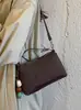 Bolso de mano casual retro para mujer, nuevo modelo otoño 2026, bolso versátil de hombro y cruzado elegante de alta calidad
