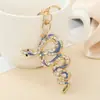 Serie de animales transfronterizos llavero colgante de boa constrictor colgante de bolsa de diamantes retro personalidad temperamento regalo pequeño