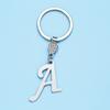 Llavero creativo de acero inoxidable con 26 letras en inglés, colgante sencillo con letras, accesorio para bolso