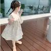 Verano 2024 nuevo vestido de princesa floral con solapa estilo coreano para niñas, vestido de verano de manga corta para niños y bebés