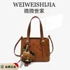 Moda Caricatura Simple 2026 Mujer Otoño Nuevo Versátil para el Trabajo Bolso de Hombro Único Bolso Cruzado de Moda Nicho de Alta Gama