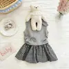 Conjunto de Verano para Bebé Niña 2026 Nuevo Estilo Camiseta sin Mangas con Lazo para Niñas Falda Corta a Cuadros Falda Floral