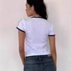 Camiseta de manga corta con cuello redondo y bordado de lazo estilo europeo y americano, estilo informal, estilo callejero, sexy, para mujer
