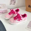Zapatillas de suela gruesa para mujer 2026 nuevas versátiles para estudiante zapatos rojos zapatos blancos dopamina H1571