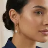 Pendientes Europeos y Americanos de Moda Ins Nicho Clásico Personalizados Creativos de Acero Inoxidable Chapado en Oro de 18K Pendientes de Circonita con Forma de Gota de Agua para Mujer