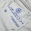 Pantalones Casuales Americanos para Hombre Tendencia Streetwear Diseño de Personalidad Sentido del Diseño Parche Letra Deshilachado Suelto Pierna Ancha Pierna Recta Pantalones Largos