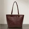 Bolso Tote para Mujer 2026 Estilo Caliente Bolso de Hombro Casual de Moda con un Toque de Alta Gama para Estudiantes Universitarias para la Clase y el Trayecto