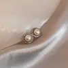 Pendientes de Perla de Circonita de Moda de Aguja Plateada Pendientes de Botón Retro de Lujo Ligero de Nicho Francés Pendientes Nuevos 2026
