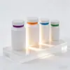 Fabricante de origen de botellas con tapa de seguridad de giro y presión, botellas de plástico serigrafiadas y estampadas en oro, especificaciones completas, botellas blancas de PET PE