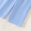Traje de verano nuevo con temperamento para niñas de Europa y Estados Unidos, conjunto de dos piezas para niños con top de tirantes de flores tridimensionales y pantalones