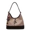 Bolsa Grande de Pelúcia Camurçada Outono/Inverno para Mulheres 2025 Nova Bolsa de Ombro Único Color Block para o Trabalho Bolsa Tote para Estudante Universitário