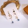 Pendientes de plata 925 con elegantes gotas de agua y borlas de luna con diamantes azules brillantes, asimétricos y largos, para mujer.