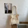 Bolso de mano versátil estilo coreano con lunares, estilo simple para el día a día, tipo cubo para mujer, alto atractivo estético, bandolera y de hombro femenino