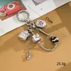 Nuevo Colgante de Bolso con Cara Sonriente de Ojos Grandes Y2K, Llavero para Teléfono, Decoración Personalizada para Bolso