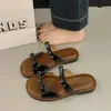 Sandalias casuales con moño, elegantes y a la moda, para mujer, nuevo modelo de verano con punta abierta y suela plana para la playa.