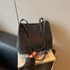 Bolso Cubo Versátil de Nicho de Moda Verano 2026 Transfronterizo para Mujer, Bolso Pequeño para el Viaje Diario, Bolso de Hombro