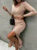 Otoño e invierno 2022 Europa y Estados Unidos comercio exterior transfronterizo nuevo para mujer color liso manga larga moda sexy falda larga con abertura conjunto de dos piezas